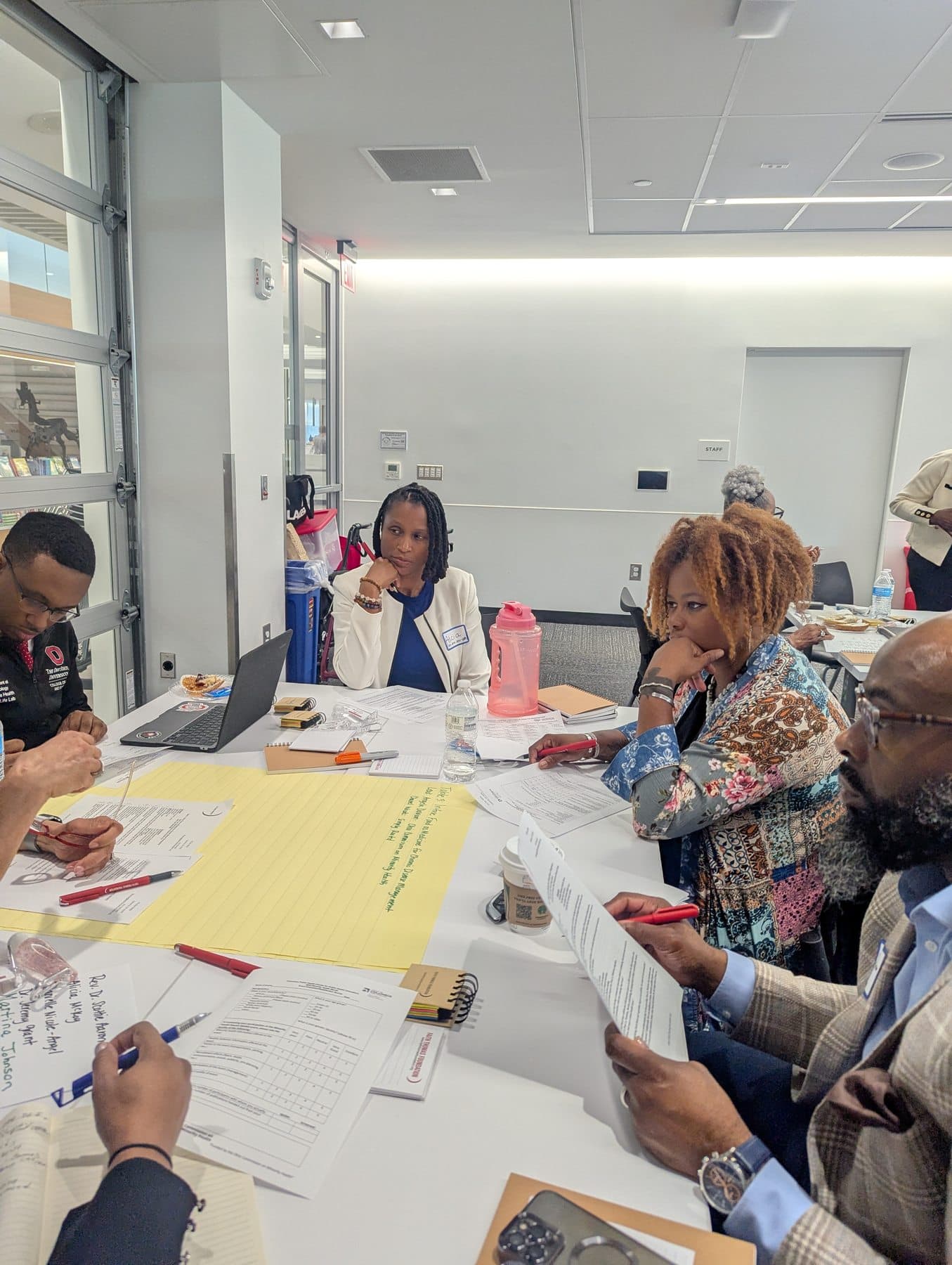 Community partners collaborating during a strategy development workshop